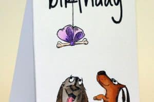 tarjetas de cumpleaños con perros jugando