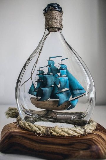 barcos hechos con botellas verticales