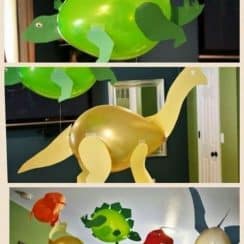 4 dinosaurios hechos con globos para decorar una fiesta